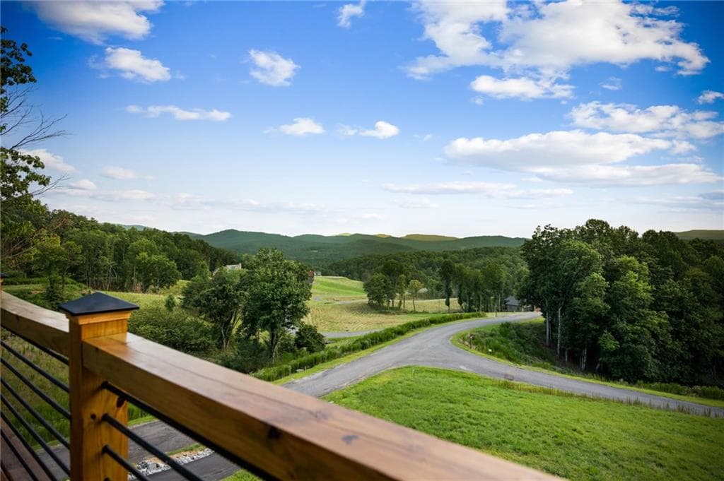 5 bedroom, 4 bathroom, 3,300 sq ft single family residence for sale at 261 Big Valley Drive, Morganton, GA 30513 — photo 5