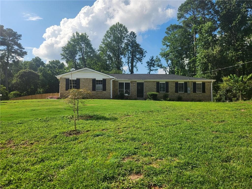 3 bedroom, 2 bathroom, 1,468 sq ft single family residence for rent at 1453 Allison Court, Lawrenceville, GA 30043 for $2,100 a month — photo 1 of 21