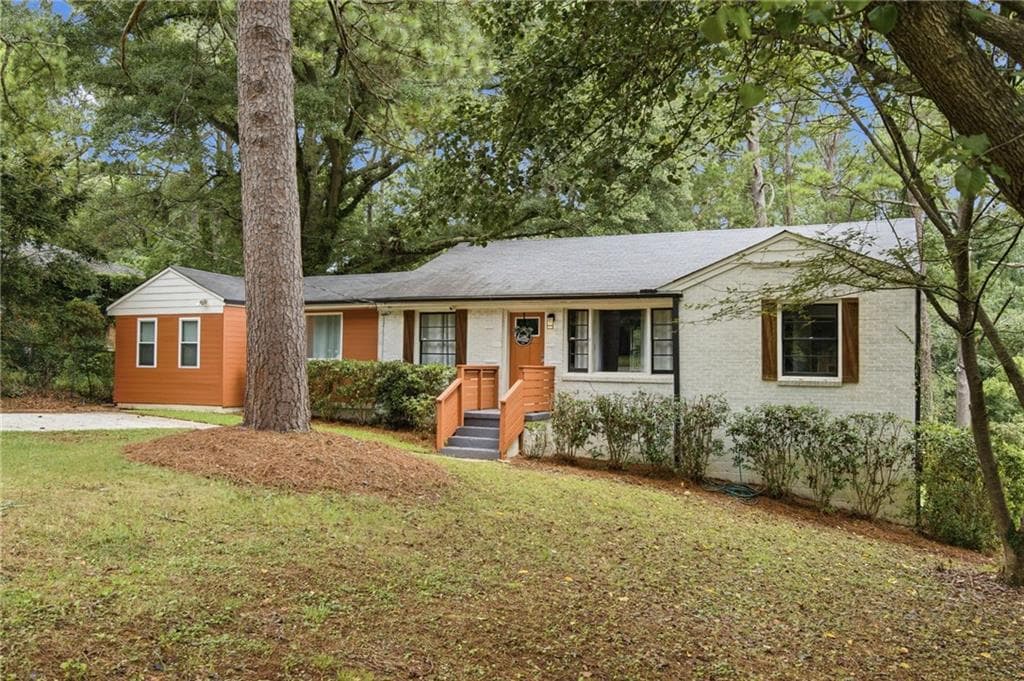 3 bedroom, 2 bathroom, 1,390 sq ft single family residence for sale at 1402 Midlawn Drive, Decatur, GA 30032