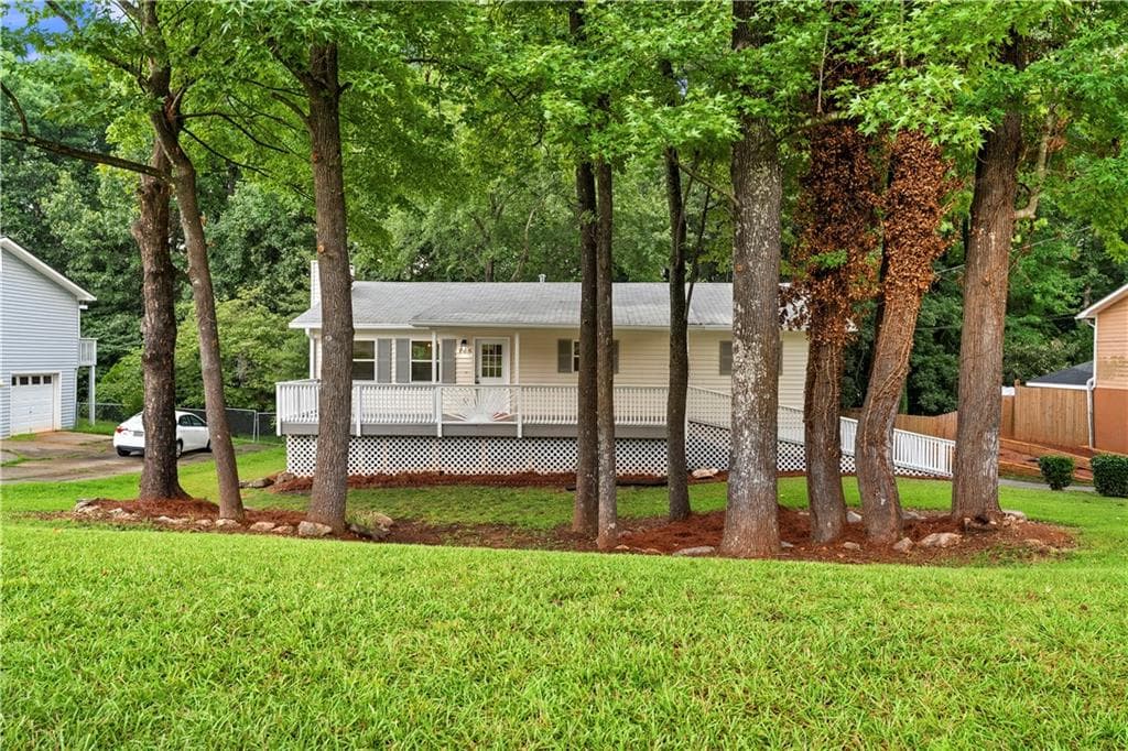 4 bedroom, 2 bathroom, 1,906 sq ft single family residence for sale at 106 Caldwell Road, Lawrenceville, GA 30046 — photo 4