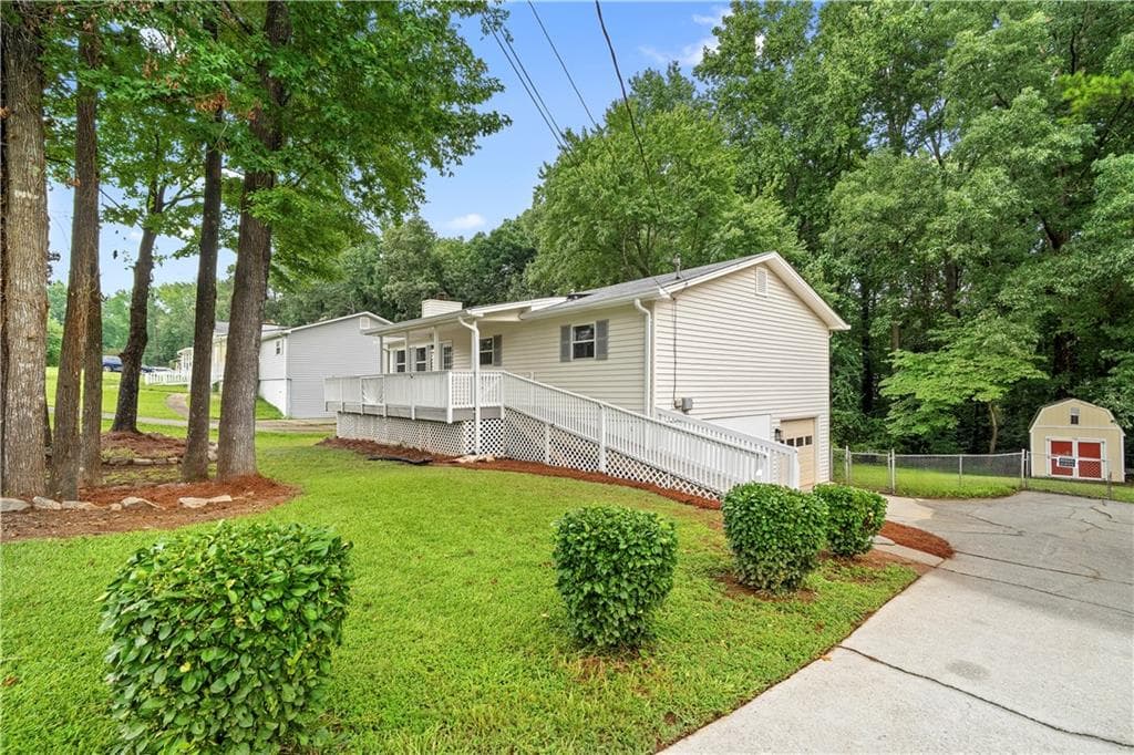 4 bedroom, 2 bathroom, 1,906 sq ft single family residence for sale at 106 Caldwell Road, Lawrenceville, GA 30046 — photo 2