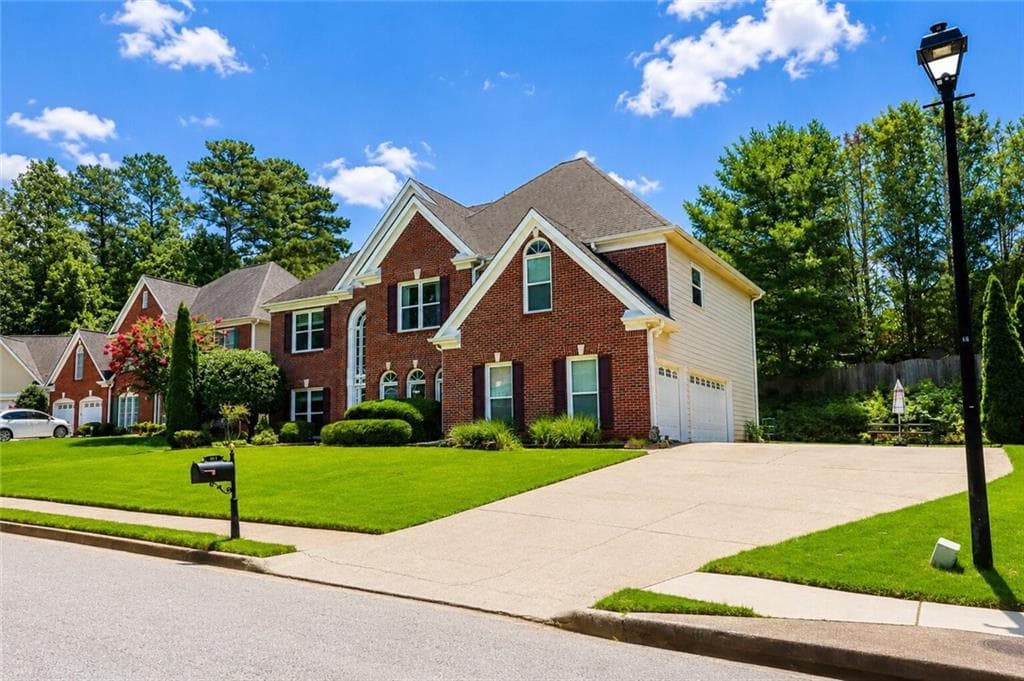 4 bedroom, 4 bathroom, 3,095 sq ft single family residence for sale at 164 Rugby Drive, Suwanee, GA 30024 — photo 2