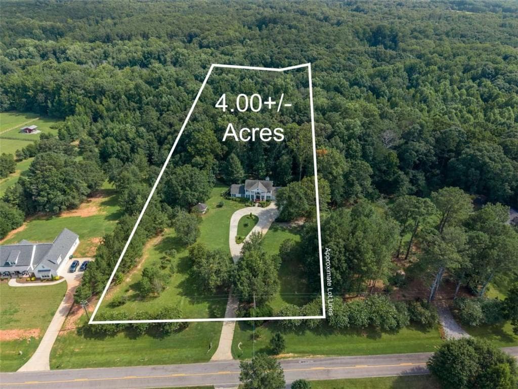 6 bedroom, 6 bathroom, 3,420 sq ft single family residence for sale at 2811 Ike Stone Road, Monroe, GA 30656 — photo 2