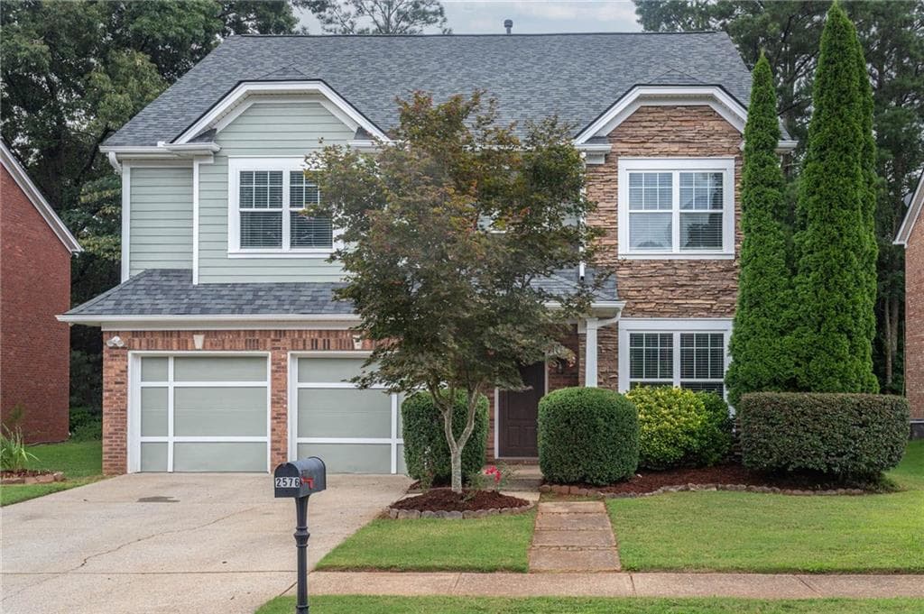 6 bedroom, 4 bathroom, 2,906 sq ft single family residence for sale at 2576 Peach Shoals Circle, Dacula, GA 30019 — photo 2