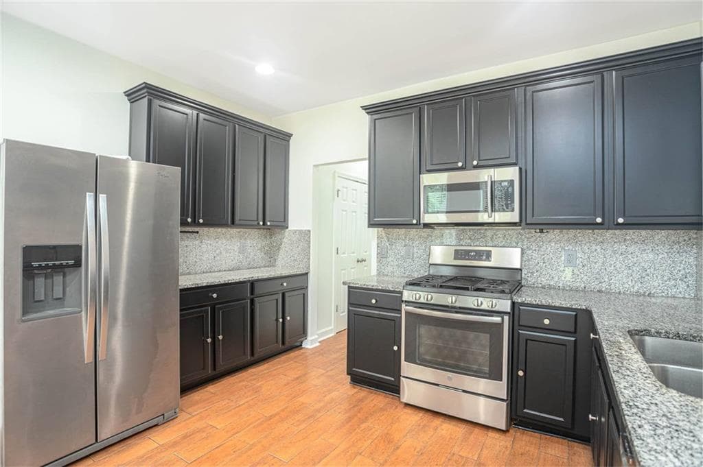 6 bedroom, 4 bathroom, 2,906 sq ft single family residence for sale at 2576 Peach Shoals Circle, Dacula, GA 30019 — photo 8