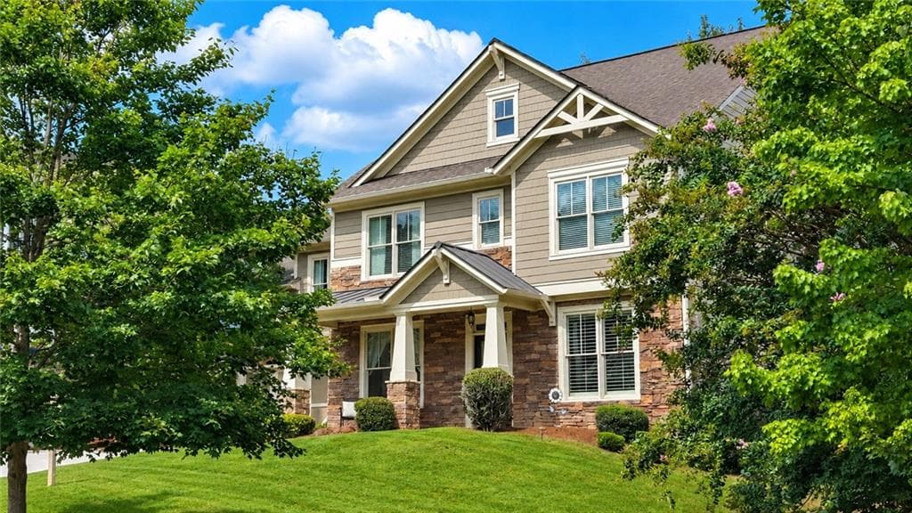 5 bedroom, 3 bathroom, 3,169 sq ft single family residence for sale at 7232 Lake Sterling Boulevard, Flowery Branch, GA 30542 — photo 2