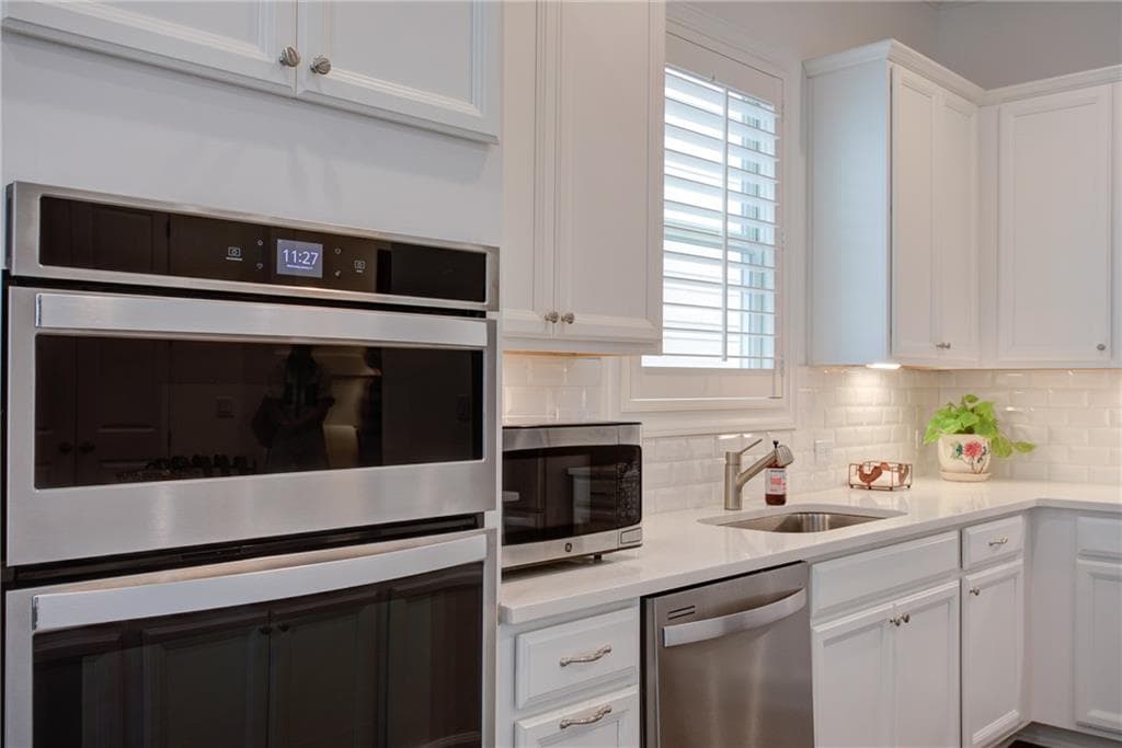 4 bedroom, 3 bathroom, 2,662 sq ft single family residence for sale at 3220 Fitzgerald Way, Cumming, GA 30041 — photo 8