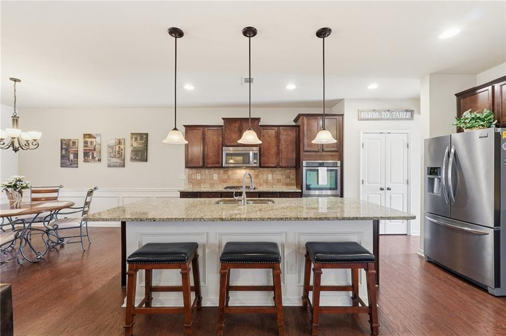 5 bedroom, 3 bathroom, 3,169 sq ft single family residence for sale at 7232 Lake Sterling Boulevard, Flowery Branch, GA 30542 — photo 7