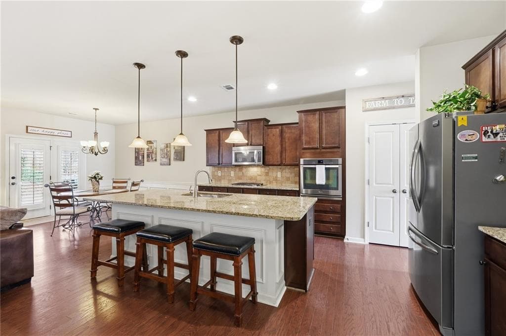 5 bedroom, 3 bathroom, 3,169 sq ft single family residence for sale at 7232 Lake Sterling Boulevard, Flowery Branch, GA 30542 — photo 8