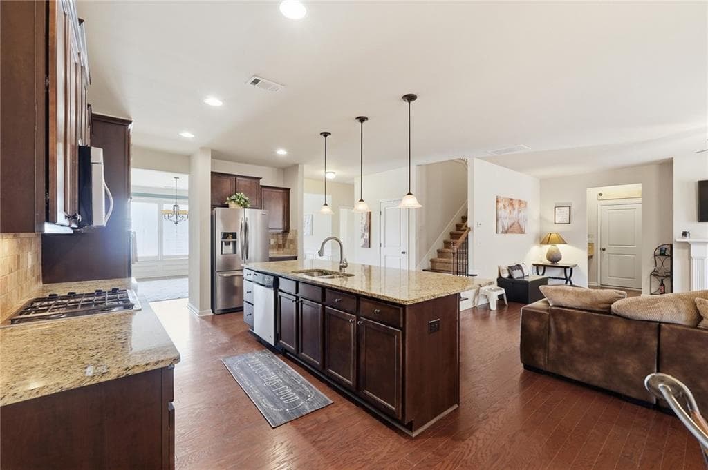 5 bedroom, 3 bathroom, 3,169 sq ft single family residence for sale at 7232 Lake Sterling Boulevard, Flowery Branch, GA 30542 — photo 9