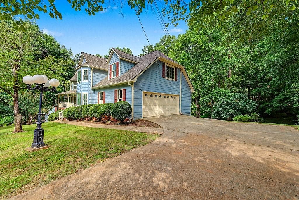 6 bedroom, 6 bathroom, 5,600 sq ft single family residence for sale at 228 Nacoochee Drive, Woodstock, GA 30188 — photo 3