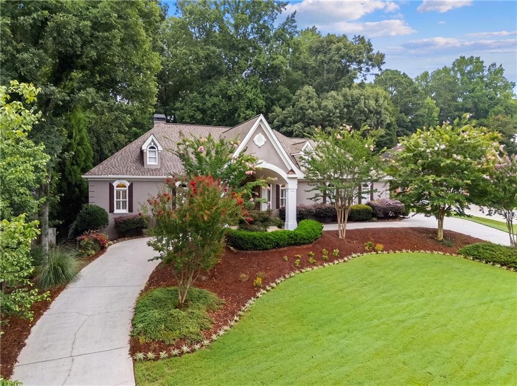 4 bedroom, 5 bathroom, 6,010 sq ft single family residence for sale at 6275 Polo Drive, Cumming, GA 30040 — photo 2