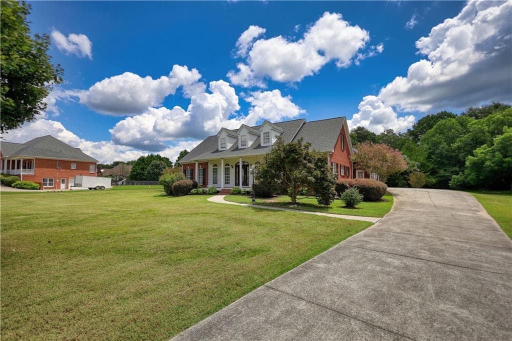 3 bedroom, 2 bathroom, 2,420 sq ft single family residence for sale at 2899 N Sharon Church Road, Loganville, GA 30052 — photo 3