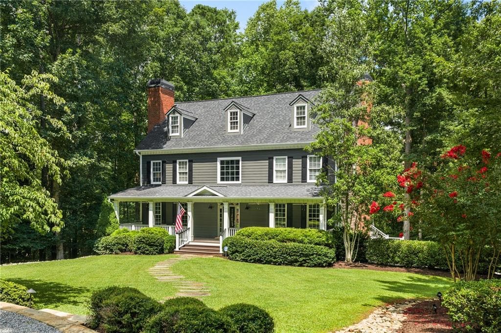 5 bedroom, 4 bathroom, 3,982 sq ft single family residence for sale at 14335 Cogburn Road, Milton, GA 30004 — photo 1 of 70