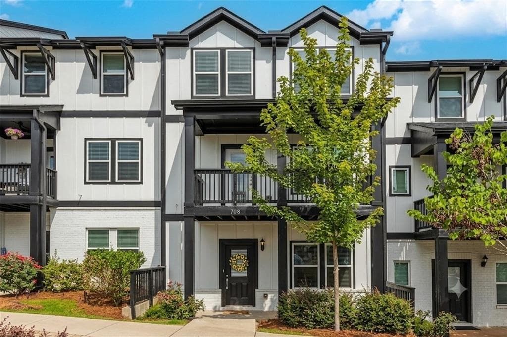 4 bedroom, 4 bathroom, 2,535 sq ft townhouse for sale at 708 Mulberry Walk, Woodstock, GA 30188 — photo 1 of 59