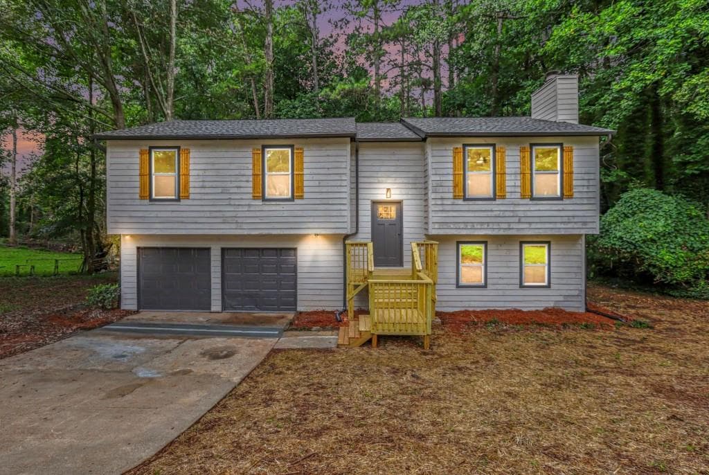 4 bedroom, 3 bathroom, 1,980 sq ft single family residence for sale at 5055 S WOODBRIDGE Trail, Stone Mountain, GA 30088 — photo 2