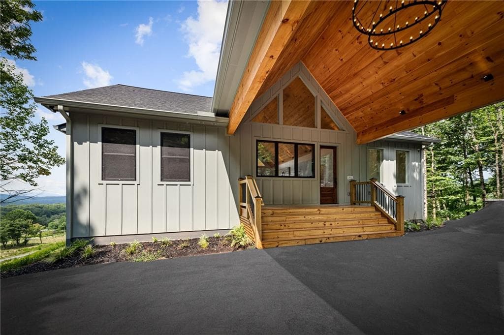 5 bedroom, 4 bathroom, 3,300 sq ft single family residence for sale at 261 Big Valley Drive, Morganton, GA 30513 — photo 2