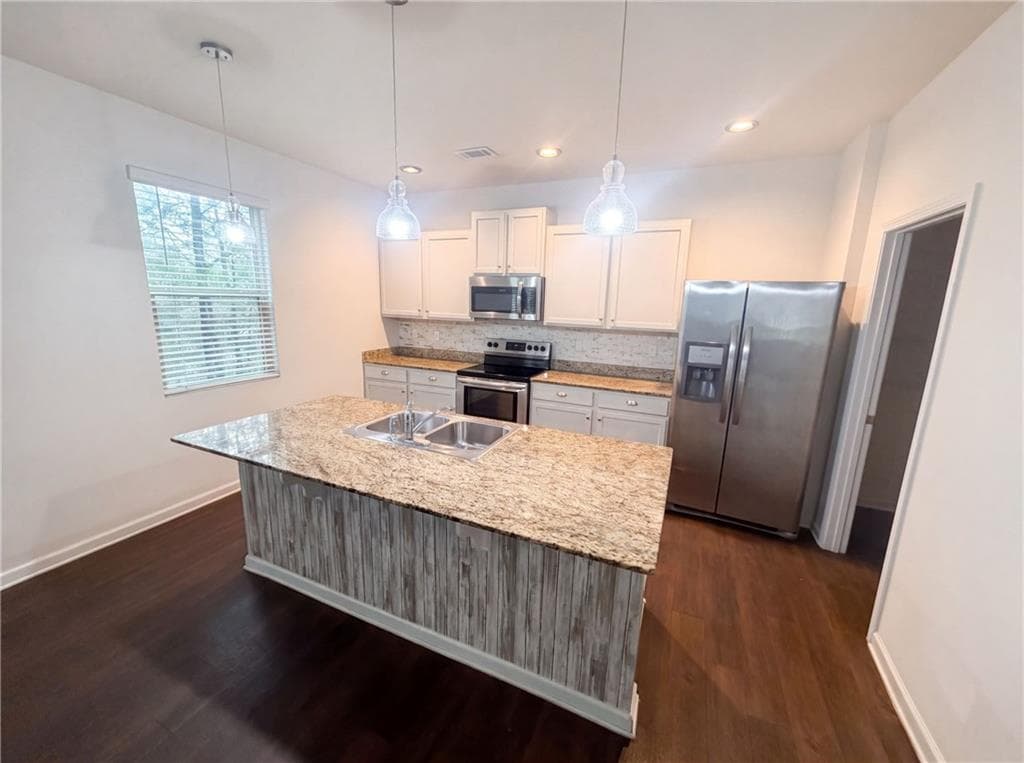 4 bedroom, 3 bathroom, 2,389 sq ft single family residence for sale at 611 Dodson Lake Court, Fairburn, GA 30213 — photo 2