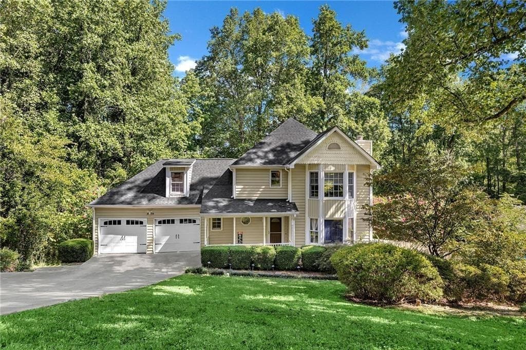 4 bedroom, 3 bathroom, 2,789 sq ft single family residence for sale at 5779 Chisholm Trail, Lilburn, GA 30047 — photo 1 of 28