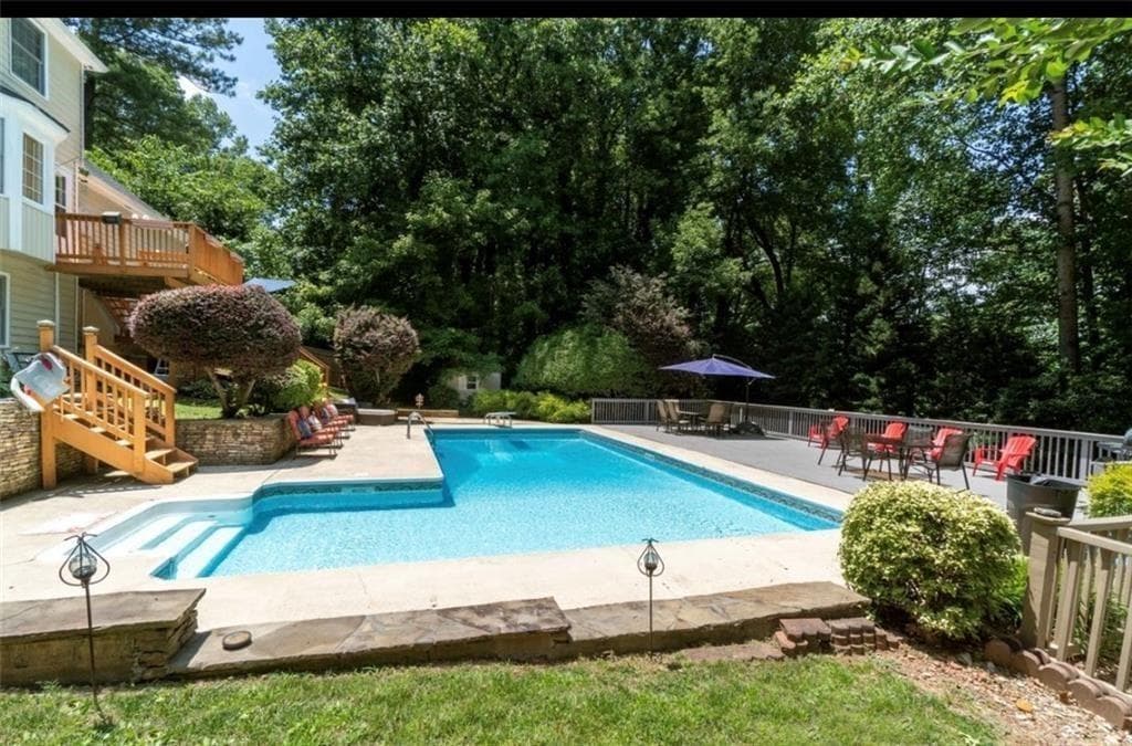 4 bedroom, 3 bathroom, 2,789 sq ft single family residence for sale at 5779 Chisholm Trail, Lilburn, GA 30047 — photo 3