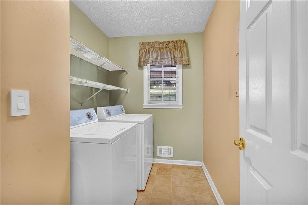 4 bedroom, 3 bathroom, 2,789 sq ft single family residence for sale at 5779 Chisholm Trail, Lilburn, GA 30047 — photo 6