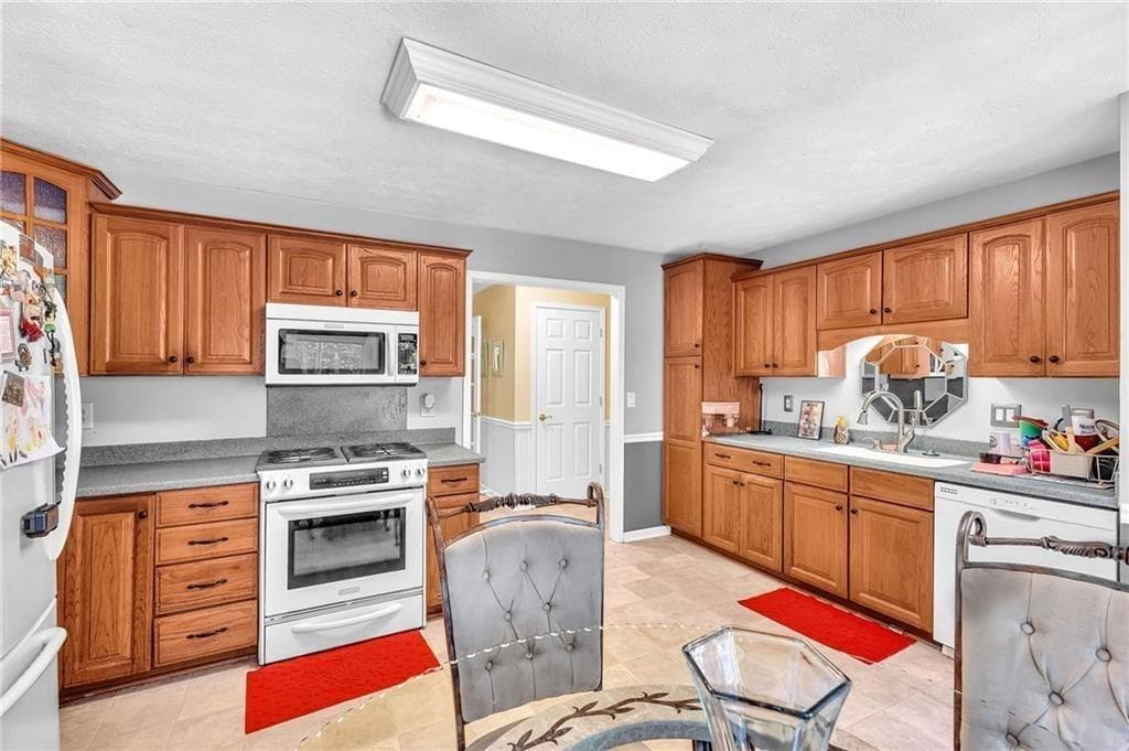 4 bedroom, 3 bathroom, 2,789 sq ft single family residence for sale at 5779 Chisholm Trail, Lilburn, GA 30047 — photo 10