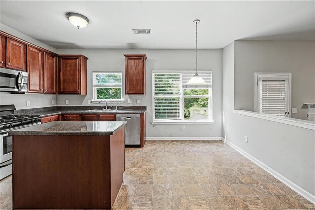 4 bedroom, 3 bathroom, 2,442 sq ft single family residence for rent at 1230 Grey Rock Way, Suwanee, GA 30024 for $2,300 a month — photo 6