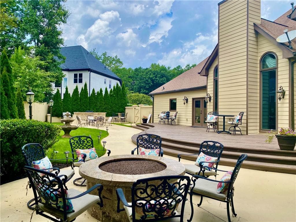 5 bedroom, 4 bathroom, 4,971 sq ft single family residence for sale at 10295 Groomsbridge Road, Johns Creek, GA 30022 — photo 3