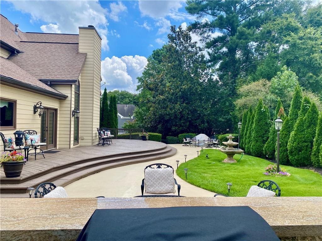 5 bedroom, 4 bathroom, 4,971 sq ft single family residence for sale at 10295 Groomsbridge Road, Johns Creek, GA 30022 — photo 4