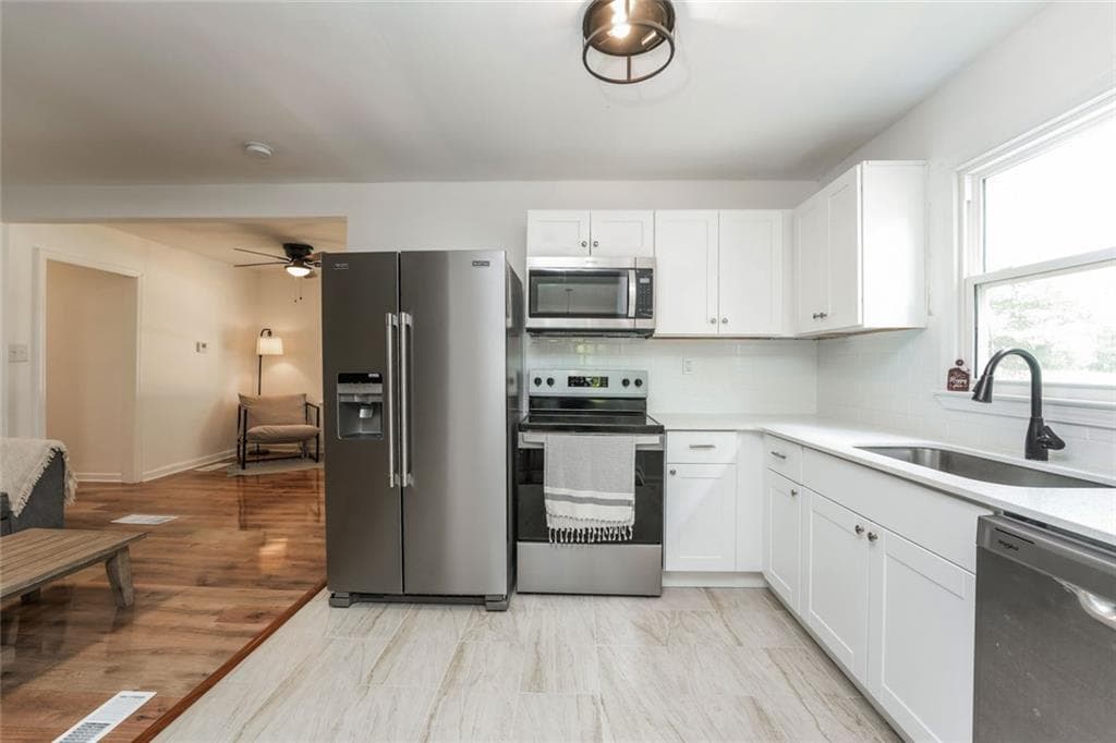 4 bedroom, 2 bathroom, 1,424 sq ft single family residence for sale at 309 Cowan Road, Conyers, GA 30094 — photo 5