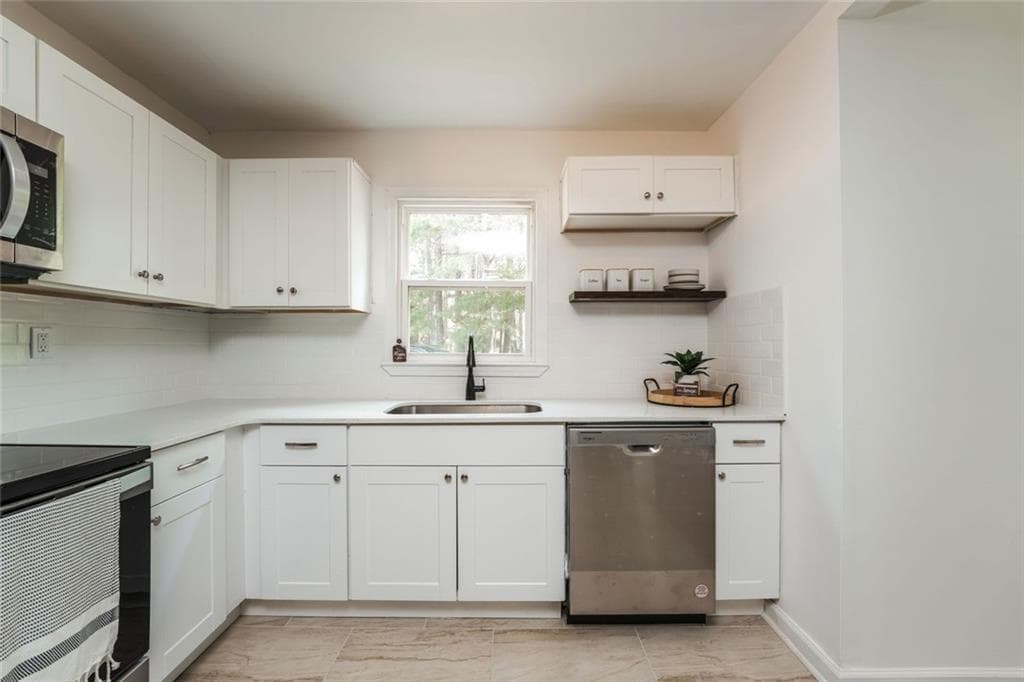 4 bedroom, 2 bathroom, 1,424 sq ft single family residence for sale at 309 Cowan Road, Conyers, GA 30094 — photo 6