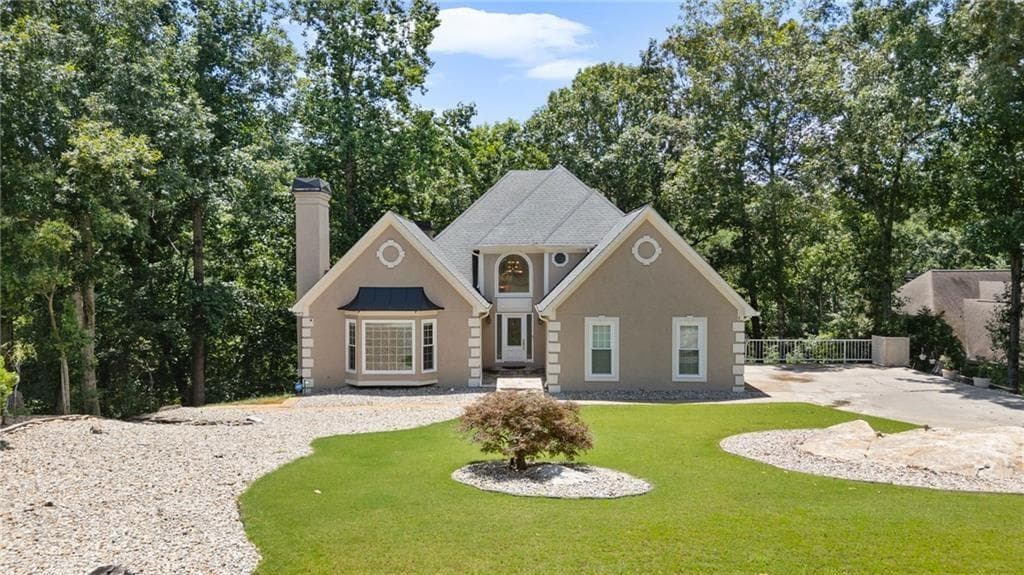 5 bedroom, 5 bathroom, 5,116 sq ft single family residence for sale at 3395 Summit Trail, Cumming, GA 30041 — photo 2