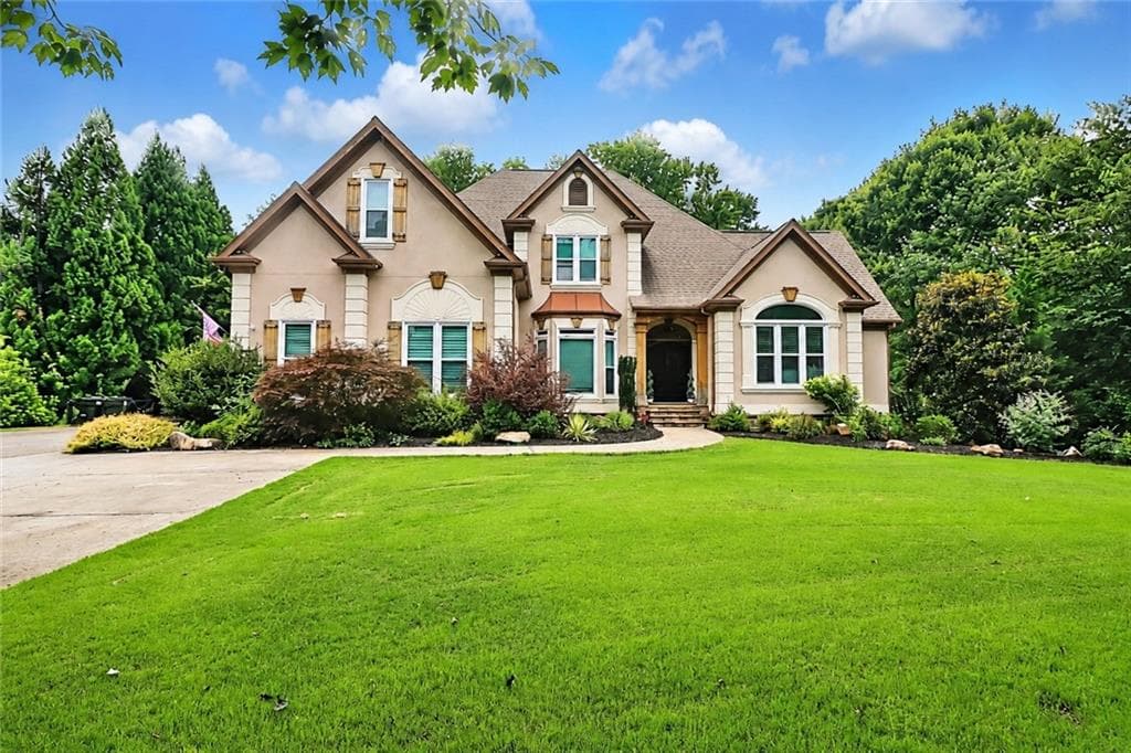 6 bedroom, 5 bathroom single family residence for sale at 915 Champions Fairway Drive, Alpharetta, GA 30004
