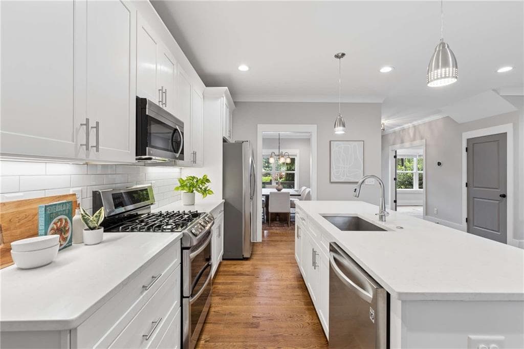 5 bedroom, 3 bathroom, 3,300 sq ft single family residence for sale at 859 East Avenue, Scottdale, GA 30079 — photo 3