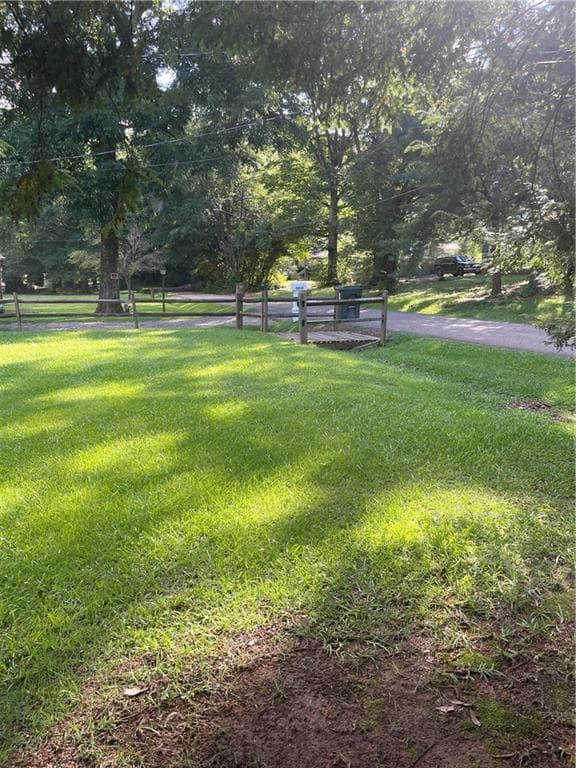 5 bedroom, 3 bathroom, 816 sq ft single family residence for sale at 5911 Church Street, Flowery Branch, GA 30542 — photo 4