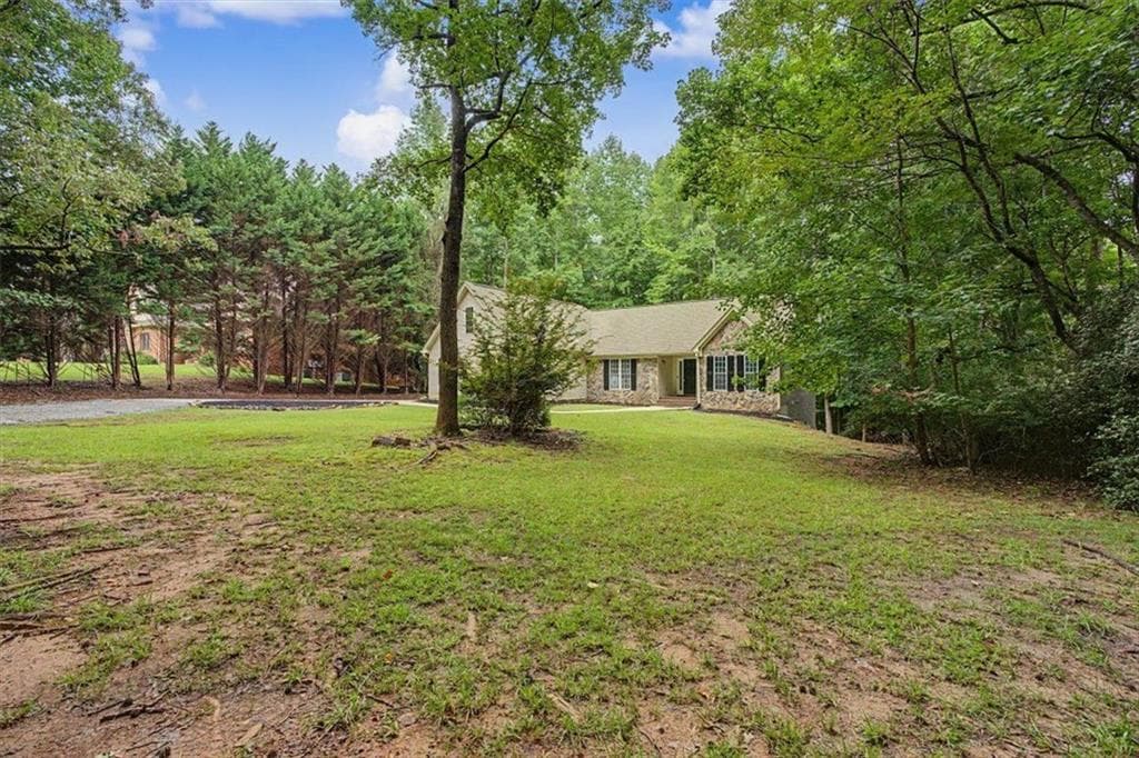 6 bedroom, 3 bathroom, 4,384 sq ft single family residence for sale at 590 S Alexander Creek Road, Newnan, GA 30263 — photo 5