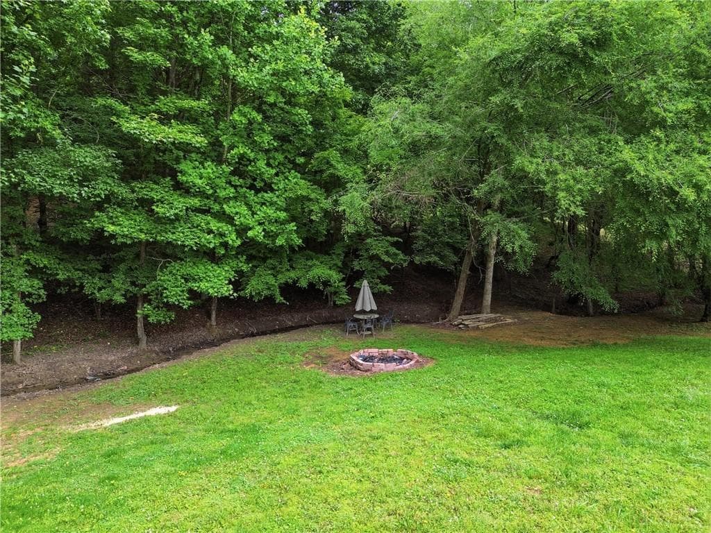 4 bedroom, 3 bathroom, 3,560 sq ft single family residence for sale at 815 Knight Bottom Road SE, Fairmount, GA 30139 — photo 5