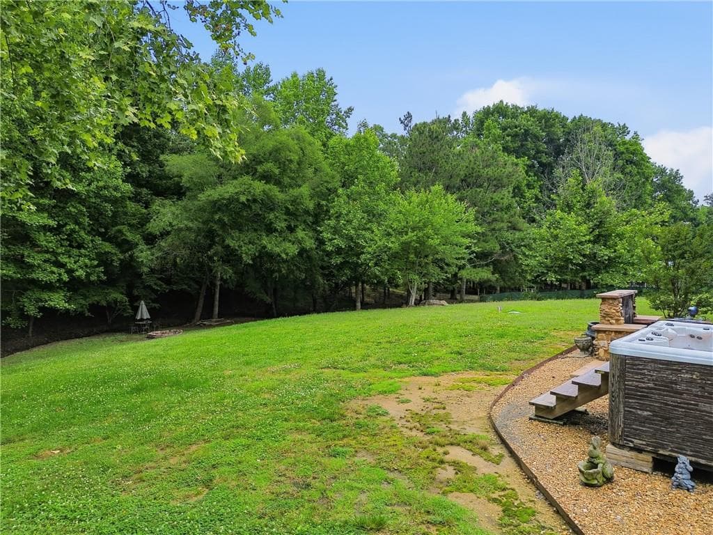 4 bedroom, 3 bathroom, 3,560 sq ft single family residence for sale at 815 Knight Bottom Road SE, Fairmount, GA 30139 — photo 7