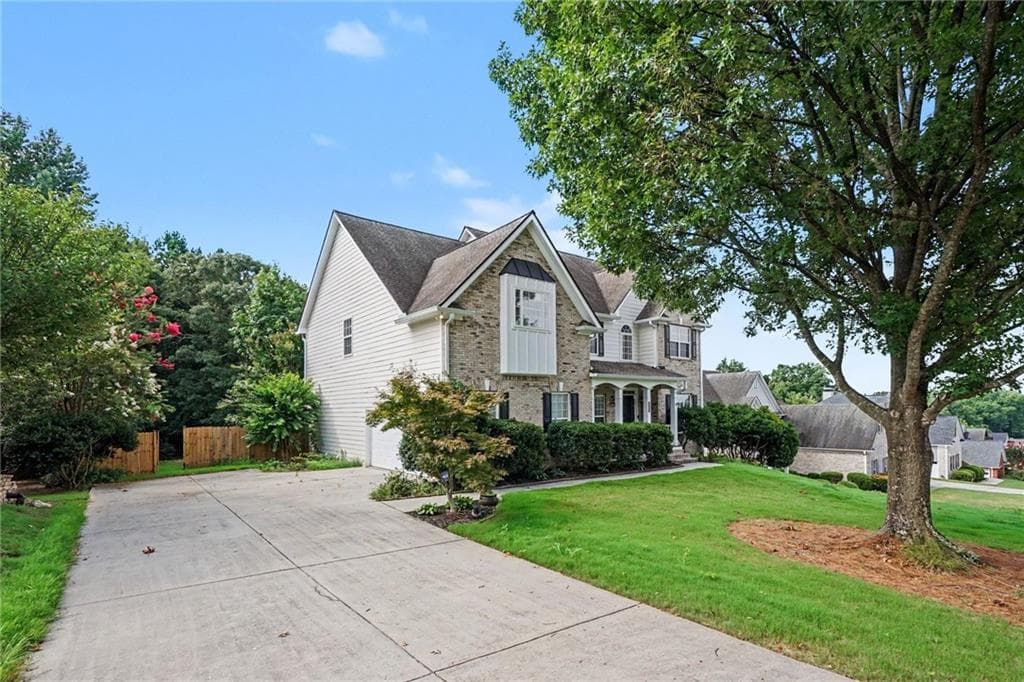 5 bedroom, 4 bathroom, 4,295 sq ft single family residence for sale at 1200 Lilac Arbor Road, Dacula, GA 30019 — photo 2