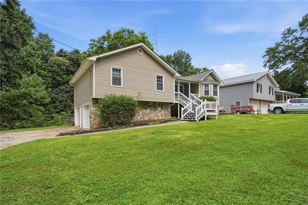 3 bedroom, 2 bathroom, 2,032 sq ft single family residence for sale at 106 Kimberly Road, Canton, GA 30115 — photo 2