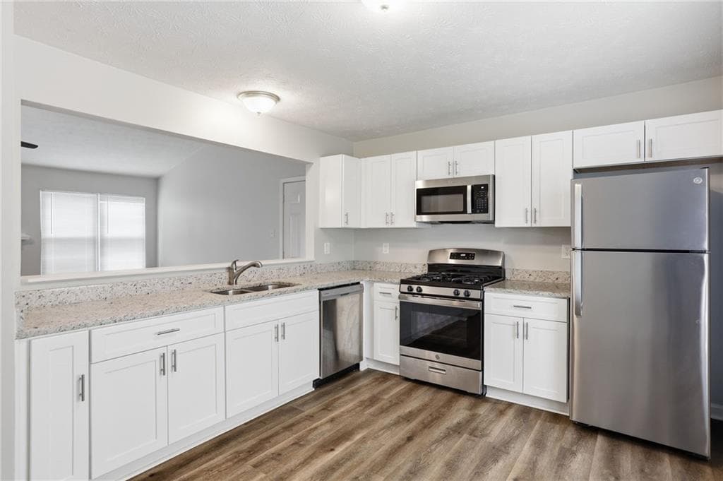 3 bedroom, 2 bathroom, 1,200 sq ft single family residence for sale at 1193 Harvest Dale Court, Stone Mountain, GA 30088 — photo 10