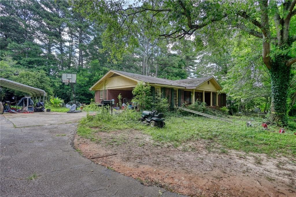 3 bedroom, 2 bathroom, 3,766 sq ft single family residence under contract at 1332 Turner Road, Lilburn, GA 30047 — photo 4
