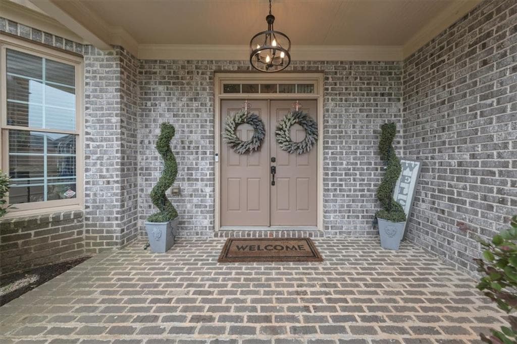 4 bedroom, 3 bathroom, 3,352 sq ft single family residence for sale at 604 Arbor Ridge, Loganville, GA 30052 — photo 2