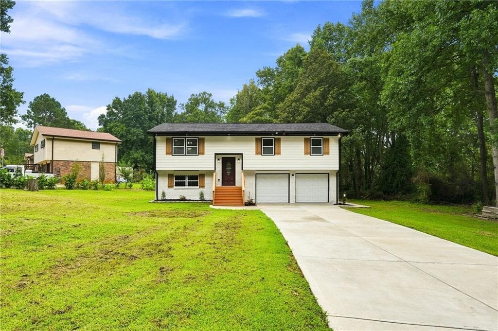 5 bedroom, 3 bathroom, 1,864 sq ft single family residence for sale at 5827 Christopher Lane, Lithonia, GA 30058