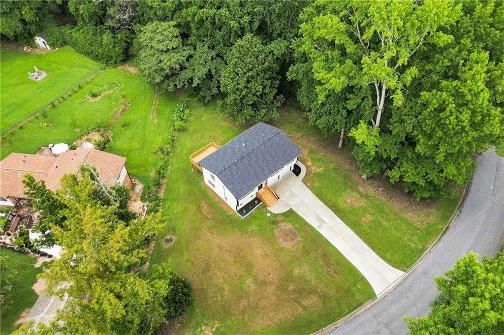 5 bedroom, 3 bathroom, 1,864 sq ft single family residence for sale at 5827 Christopher Lane, Lithonia, GA 30058 — photo 2