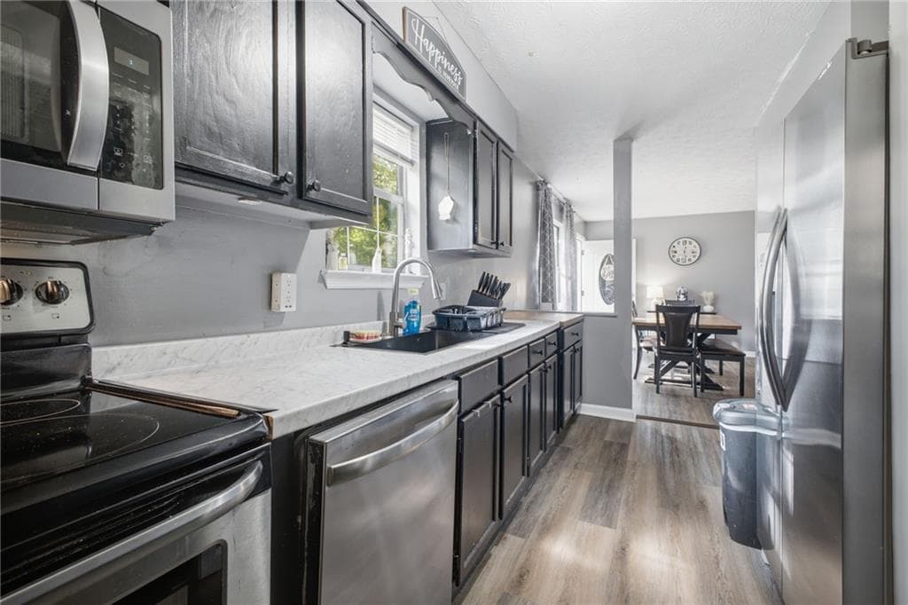 5 bedroom, 3 bathroom, 1,916 sq ft single family residence for sale at 379 Bozeman Road, White, GA 30184 — photo 5