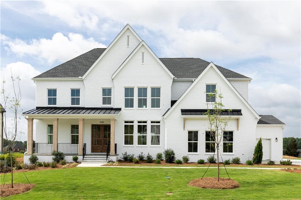 5 bedroom, 6 bathroom, 5,227 sq ft single family residence for sale at 1630 Ledgestone Way, Lawrenceville, GA 30043 — photo 2