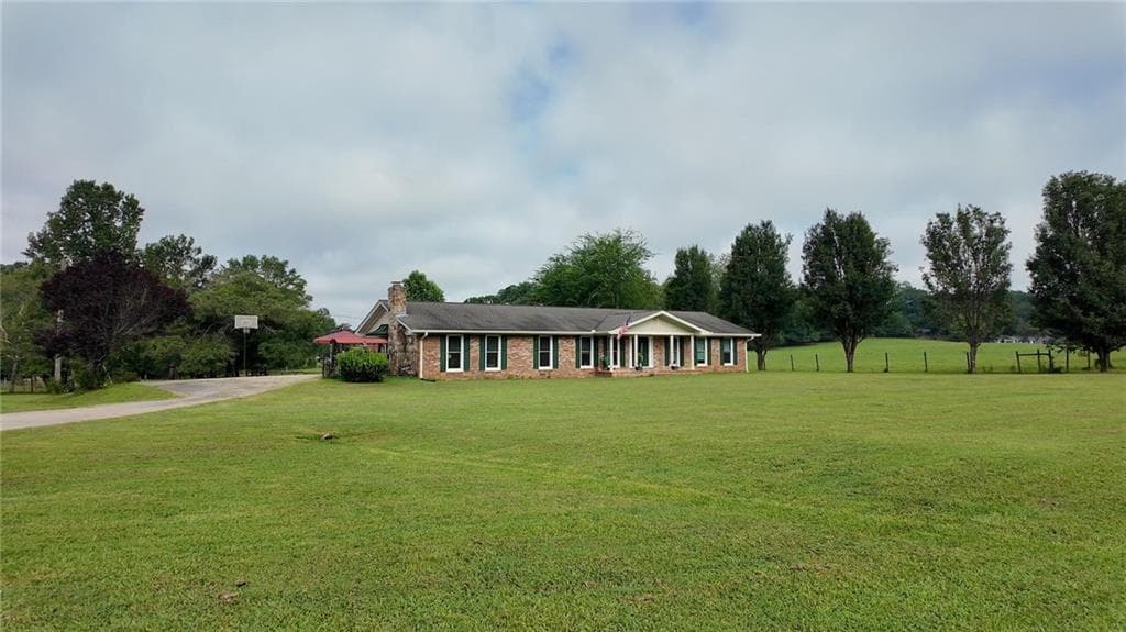 3 bedroom, 2 bathroom, 3,200 sq ft single family residence for sale at 12621 Highway 142, Oxford, GA 30054 — photo 2