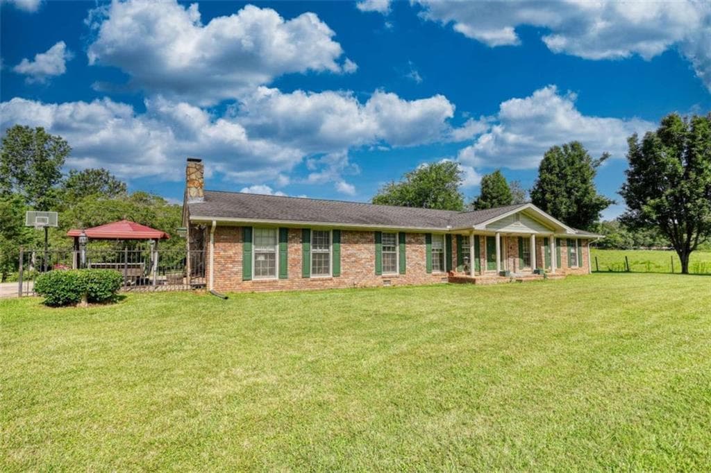 3 bedroom, 2 bathroom, 3,200 sq ft single family residence for sale at 12621 Highway 142, Oxford, GA 30054 — photo 4
