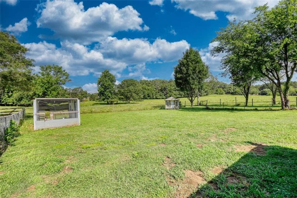 3 bedroom, 2 bathroom, 3,200 sq ft single family residence for sale at 12621 Highway 142, Oxford, GA 30054 — photo 8
